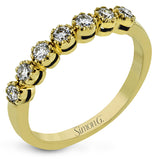 Perfect for stacking or wearing alone, this 18K yellow gold band features .37cttw diamonds.