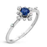 This 18k white gold ring adds the perfect pop of bright color to any outfit.