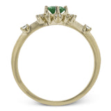 This charming 18k yellow gold ring is perfect for stacking and contains a .35 ct center tsavorite stone and .13 ctw accent diamonds.
