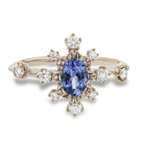 This 18k rose gold ring features is a wonderful, colorful addition to any jewelry wardrobe.