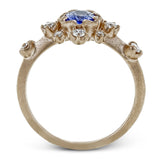 This 18k rose gold ring features is a wonderful, colorful addition to any jewelry wardrobe.