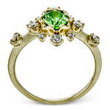 This 18k yellow gold fashion ring is set with .28 ctw of diamonds and a bright tsavorite garnet center stone.
