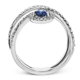 This 18k white gold ring has a lovely looping design which hold a .42 ctw sapphire gemstone.