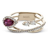 This dynamic 18k rose gold ring features a .45 ct ruby gemstone and .32 ctw of pear and round shape white diamonds.