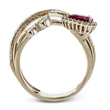 This dynamic 18k rose gold ring features a .45 ct ruby gemstone and .32 ctw of pear and round shape white diamonds.