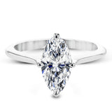 This solitaire ring design is built to perfectly showcase a beautiful marquise shaped center stone.