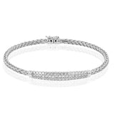 The perfect addition to any stack or worn alone, this 18K white gold bangle bracelet features 1.32cttw diamonds.