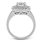 Rows of diamonds create a stunning effect in this 18k white gold engagement ring made for a round diamond. A total of .65 ctw of round diamonds and .35 ctw marquise diamonds surround the center stone.
