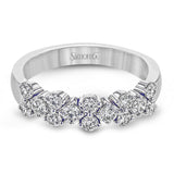 This ring features and expanse of .84 ctw of offset diamonds, creating a geometric look that can pair with any look.