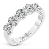 This ring features and expanse of .84 ctw of offset diamonds, creating a geometric look that can pair with any look.