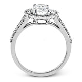 This delightful engagement ring features a scalloped halo that surrounds the center stone like a flower, containing .52 ctw of white diamonds.