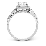 Reflecting a lovely romantic design, this white gold classic engagement ring features .16 ctw round cut white diamond accents.