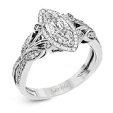 This amazing 18k white gold engagement ring features vintage-inspired design elements set with .28 ctw of white diamonds.