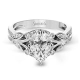 This amazing 18k white gold engagement ring features vintage-inspired design elements set with .28 ctw of white diamonds.