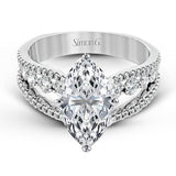The lovely vintage style of this white gold engagement ring is further enhanced by .91 ctw of shimmering round cut diamonds.