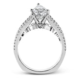 The lovely vintage style of this white gold engagement ring is further enhanced by .91 ctw of shimmering round cut diamonds.
