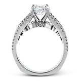 The lovely vintage style of this white gold engagement ring is further enhanced by .91 ctw of shimmering round cut diamonds.
