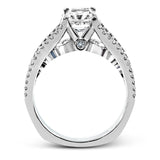 The lovely vintage style of this white gold engagement ring is further enhanced by .91 ctw of shimmering round cut diamonds.