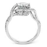 Classic with a modern twist, this white gold engagement ring features .50 ctw of sparkling white diamonds in a dramatic openwork design.