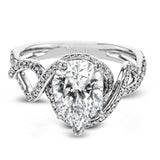 Classic with a modern twist, this white gold engagement ring features .50 ctw of sparkling white diamonds in a dramatic openwork design.
