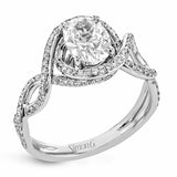 Classic with a modern twist, this white gold engagement ring features .50 ctw of sparkling white diamonds in a dramatic openwork design.