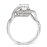 Classic with a modern twist, this white gold engagement ring features .50 ctw of sparkling white diamonds in a dramatic openwork design.