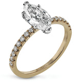 This distinctive bridal set design features a double-layer wedding band that fits around the engagement ring. The set contains .77 ctw of white diamonds.