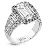 This gorgeous engagement ring makes quite the appearance with .83 ctw of round diamonds along with .83 ctw of baguette diamonds.