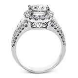 This gorgeous engagement ring makes quite the appearance with .83 ctw of round diamonds along with .83 ctw of baguette diamonds.