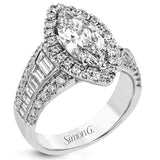 This gorgeous engagement ring makes quite the appearance with .83 ctw of round diamonds along with .83 ctw of baguette diamonds.