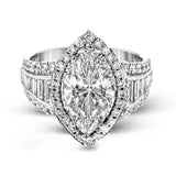 This gorgeous engagement ring makes quite the appearance with .83 ctw of round diamonds along with .83 ctw of baguette diamonds.