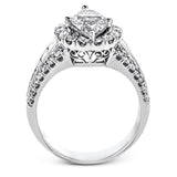 This gorgeous engagement ring makes quite the appearance with .83 ctw of round diamonds along with .83 ctw of baguette diamonds.