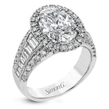 This gorgeous engagement ring makes quite the appearance with .83 ctw of round diamonds along with .83 ctw of baguette diamonds.