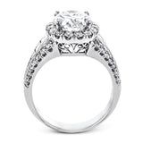 This gorgeous engagement ring makes quite the appearance with .83 ctw of round diamonds along with .83 ctw of baguette diamonds.