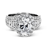 This gorgeous engagement ring makes quite the appearance with .83 ctw of round diamonds along with .83 ctw of baguette diamonds.