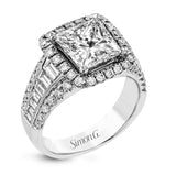 This gorgeous engagement ring makes quite the appearance with .83 ctw of round diamonds along with .83 ctw of baguette diamonds.