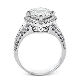 This gorgeous engagement ring makes quite the appearance with .83 ctw of round diamonds along with .83 ctw of baguette diamonds.