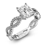 The intricate twisted design of this modern white gold engagement ring and wedding band set is set with .65 ctw of striking round cut white diamonds.
