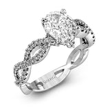 The intricate twisted design of this modern white gold engagement ring and wedding band set is set with .65 ctw of striking round cut white diamonds.