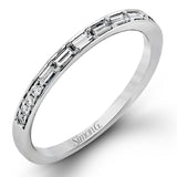 This dazzling white gold wedding set is enhanced by .21 ctw round cut white diamonds with side accents of .53 ctw of baguette cut diamonds.