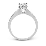 This dazzling white gold wedding set is enhanced by .21 ctw round cut white diamonds with side accents of .53 ctw of baguette cut diamonds.