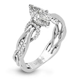 This impressive contemporary white engagement ring features a unique twisting design on the shank, which is complemented by .17 ctw of round cut white diamonds.