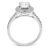 This beautiful, classic style setting features a double halo design built for an oval center stone. It contains .40 ctw of side diamonds.