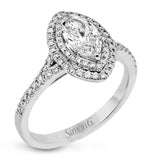 This beautiful, classic style setting features a double halo design built for an oval center stone. It contains .40 ctw of side diamonds.