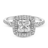 This beautiful, classic style setting features a double halo design built for an oval center stone. It contains .40 ctw of side diamonds.