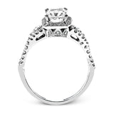 Reflecting an intricate modern design, this remarkable white gold ring is emphasized by a lovely halo complemented with .59 ctw round cut white diamonds.