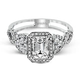 Reflecting an intricate modern design, this remarkable white gold ring is emphasized by a lovely halo complemented with .59 ctw round cut white diamonds.