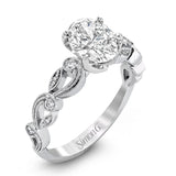 This beautiful vintage-inspired engagement ring design is built for an oval center stone and contains the perfect touches of .28 ctw of white diamonds in its midst.