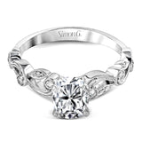 This beautiful vintage-inspired engagement ring design is built for an oval center stone and contains the perfect touches of .28 ctw of white diamonds in its midst.