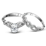 This beautiful vintage-inspired engagement ring design is built for an oval center stone and contains the perfect touches of .28 ctw of white diamonds in its midst.